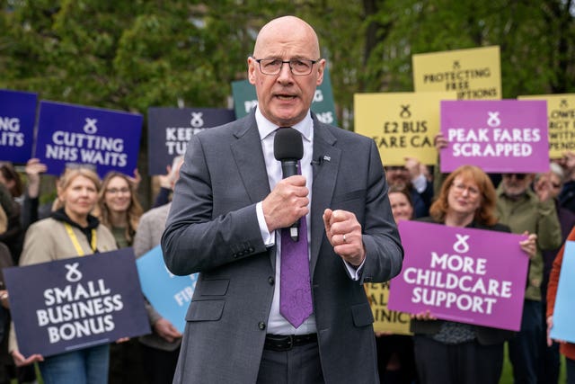 John Swinney delivers an eve-of-poll speech at a rally with SNP candidates and activists