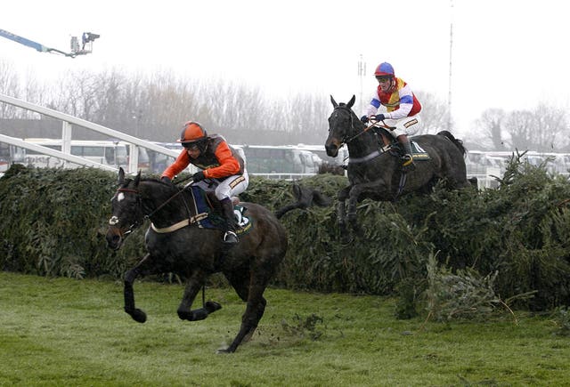 Katarino and Sam Waley-Cohen jumping the last in the 2006 Foxhunters'