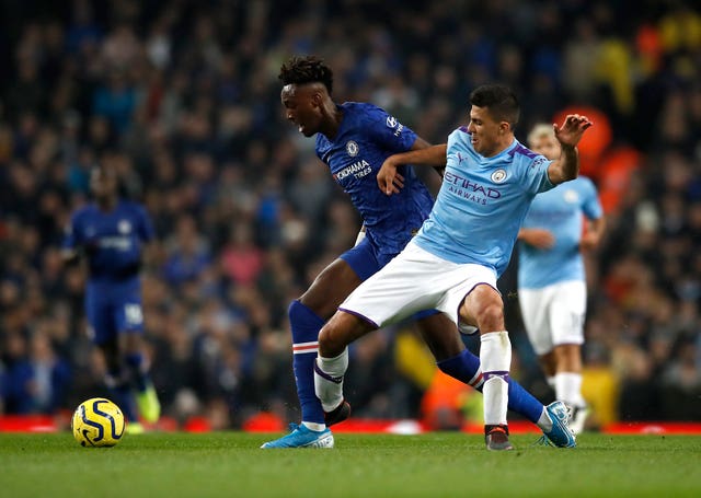Rodri (right) is determined to battle through City's tough period