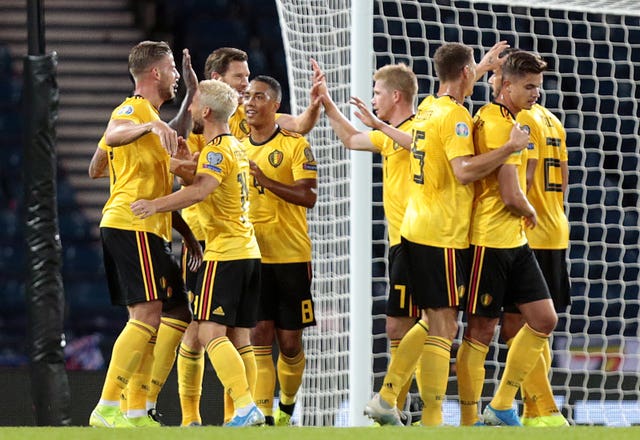 Toby Alderweireld, left, celebrates with team-mates after scoring Belgium''s third goal