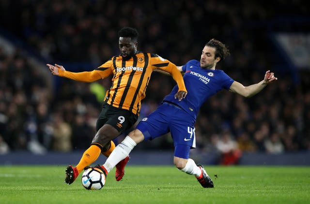 Cesc Fabregas (right) challenges Abel Hernandez for the ball in Friday night's FA Cup tie