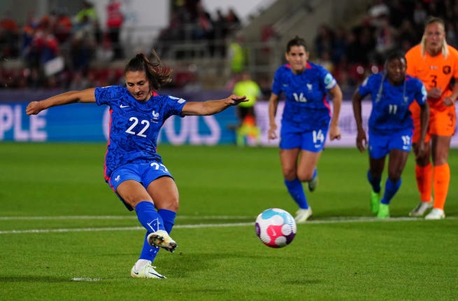 France's Eve Perisset scores a penalty
