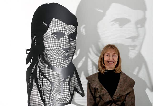 Curator Sheilagh Tennant with David Begbie's steel mesh portrait of Robert Burns at the Burns Unbroke exhibition (Jane Barlow/PA)