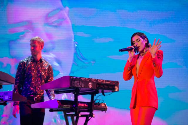 Calvin Harris and Dua Lipa are celebrating a second week at number one with One Kiss. 