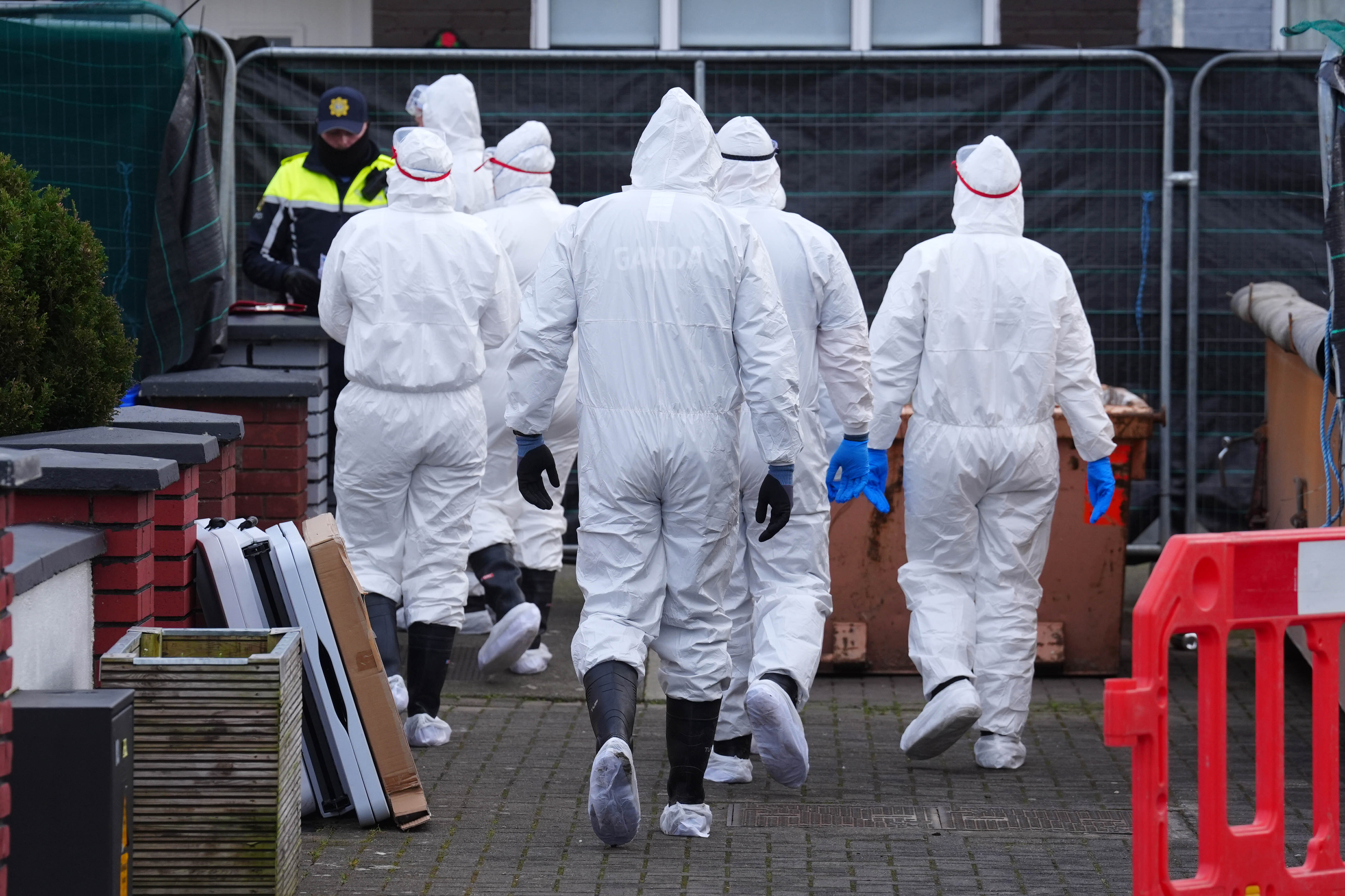 Forensic officers at a house being searched in Navan