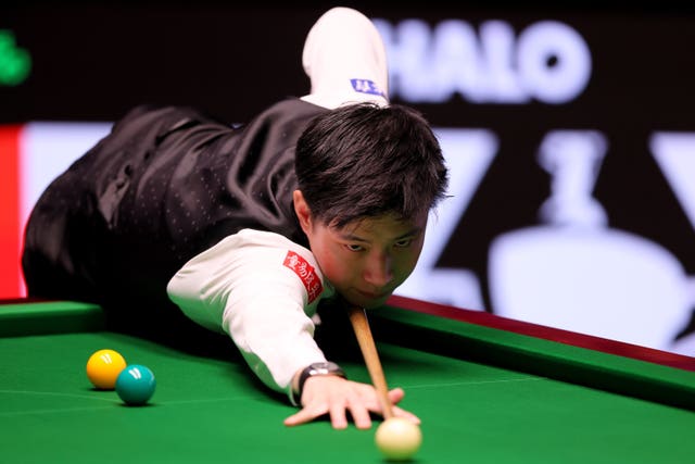 Zhao Xintong during his match against Ronnie O’Sullivan (not pictured) on day thirteen of the Halo World Snooker Championship at the Crucible Theatre, Sheffield.
