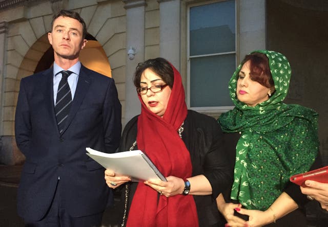 Bijan Ebrahimi’s sisters Manizhah Moore (centre) and Ladin Ebrahimi outside Bristol Crown Court with Tony Murphy of Bhatt Murphy Solicitors (Claire Hayhurst/PA)