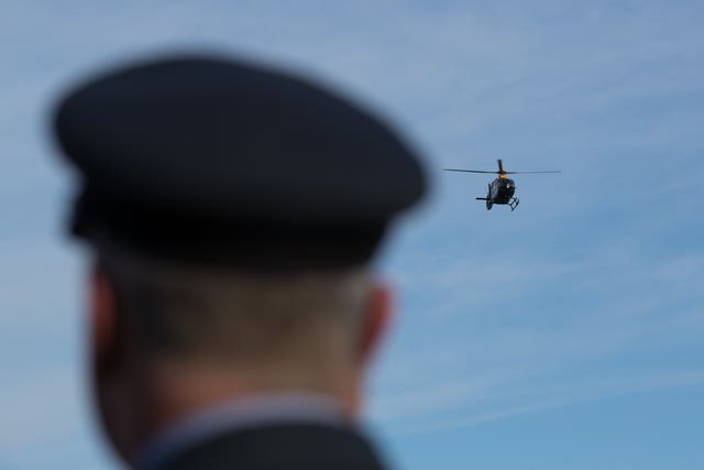 A flypast by a Juno helicopter at the funeral at RAF Cosford (Aaron Chown/PA Wire)