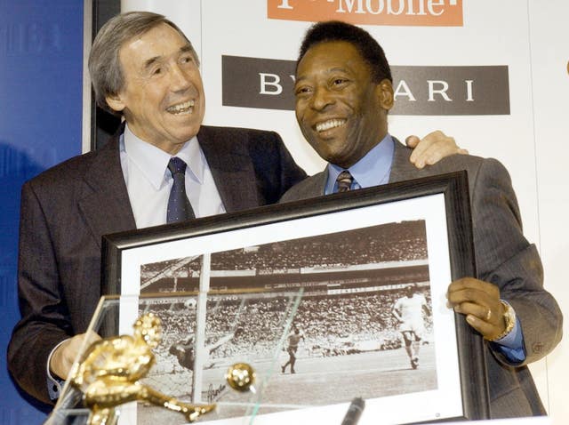 Banks, left,with a picture of his famous save from Brazil striker Pele