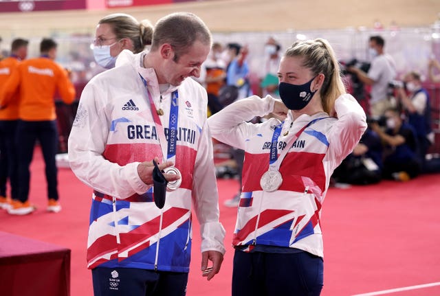 Great Britain’s Laura Kenny and Jason Kenny with their silver medals at the Izu Velodrome