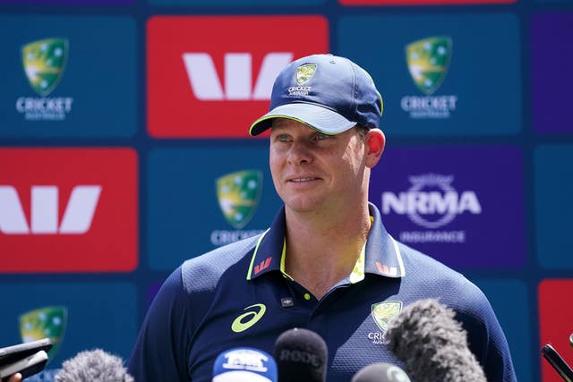 Australia’s Steve Smith takes questions during a press conference at The Gabba