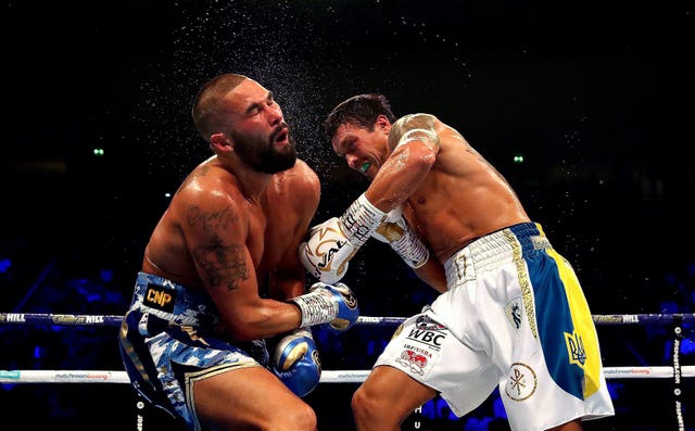 Usyk, right, stopped Tony Bellew when they fought in November 2018 (Nick Potts/PA)