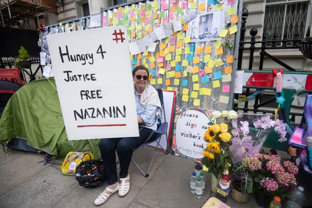 Supporters outside the Iranian Embassy