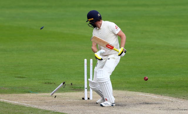 England’s Chris Woakes is bowled out by West Indies’ Kemar Roach 