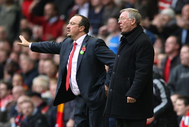 Rafael Benitez (left) went head to head with Sir Alex Ferguson during his time in charge of Liverpool. (Mike Egerton/EMPICS Sport)