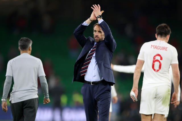 Gareth Southgate applauds the fans after the victory in Seville 