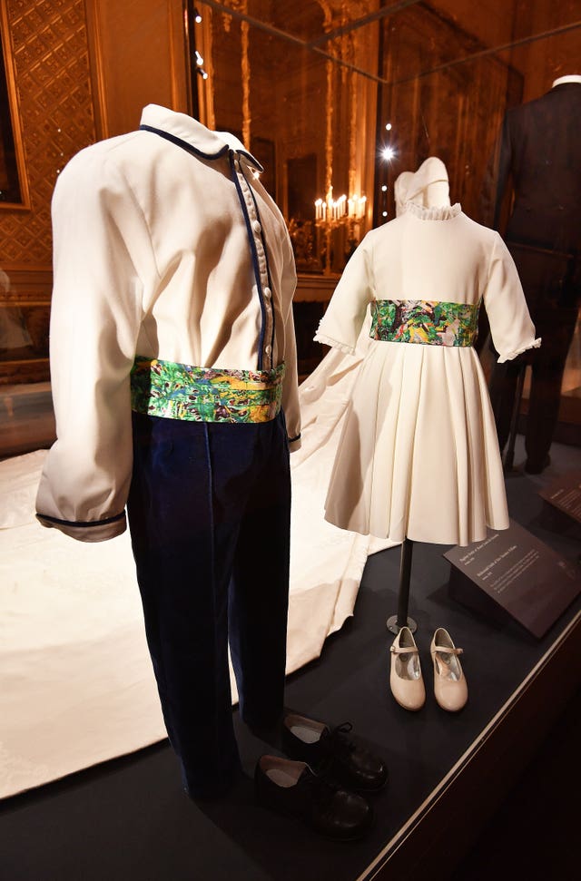 A page boy and bridesmaid outfit