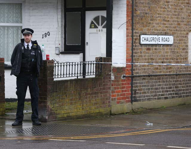 A police officer near the scene of the Tottenham shooting (Jonathan Brady/PA)