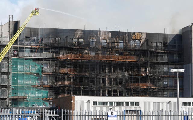 Firefighters at the scene of the fire in Dagenham