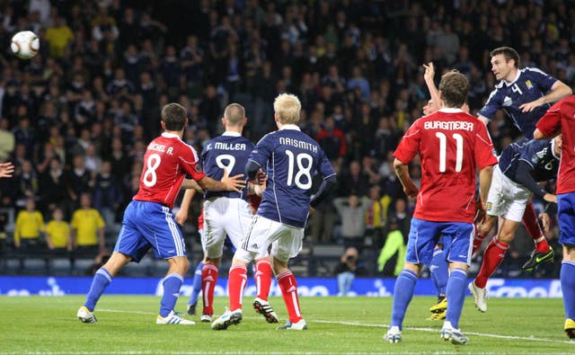 Scotland’s Stephen McManus heads the winner against Liechtenstein