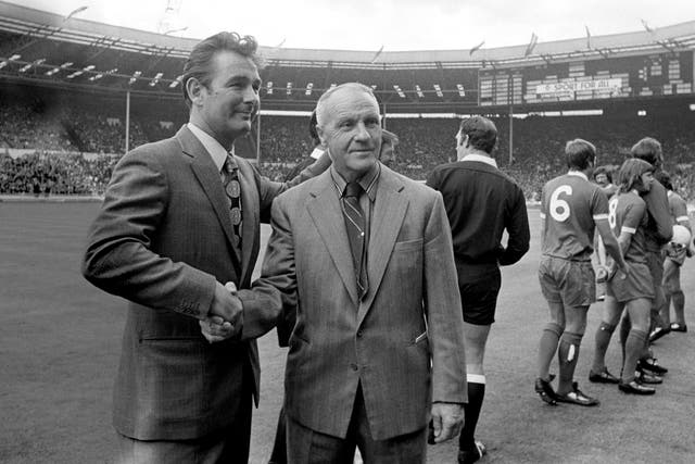 Clough (left), pictured with Liverpool manager Bill Shankly, made a big impression on the English game 