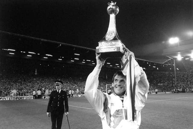 Kenny Dalglish celebrates his third league championship as Liverpool boss in 1990. He left the club the following year