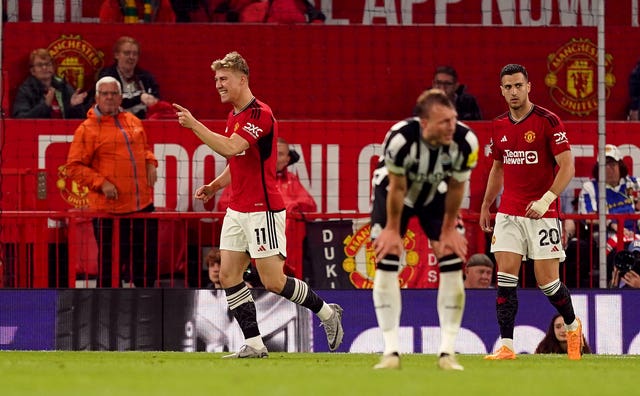 Rasmus Hojlund celebrates scoring United''s third