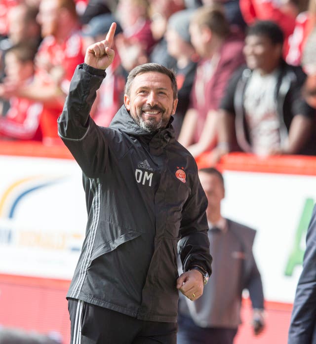 Aberdeen manager Derek McInnes could still raise a smile despite his side's defeat at Tynecastle