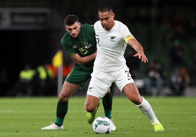 Troy Parrott, left, clashed with New Zealand's Winston Reid