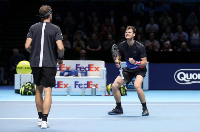 Jamie Murray (right) and Bruno Soares celebrate winning their doubles match (Adam Davy/PA).