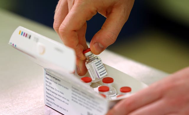 Doses of the Oxford/AstraZeneca vaccine are checked
