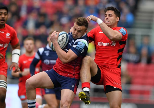 Bristol Bears' Andy Uren and Saracens Sean Maitland battle for the ball as Bristol beat Saracens 23-21