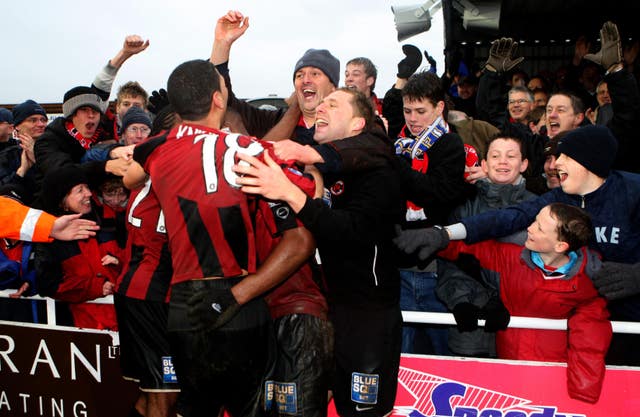 Histon's players and fans celebrated a famous FA Cup victory over Leeds in 2008