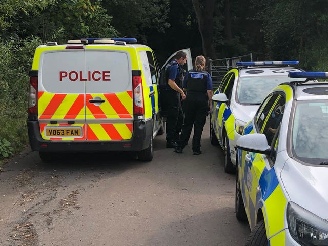 Police at the scene at Brown Clee Hill in Shropshire