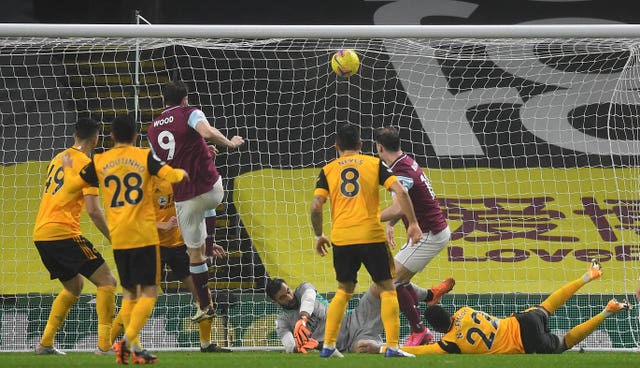 Chris Wood scores what proved to be the winner for Burnley