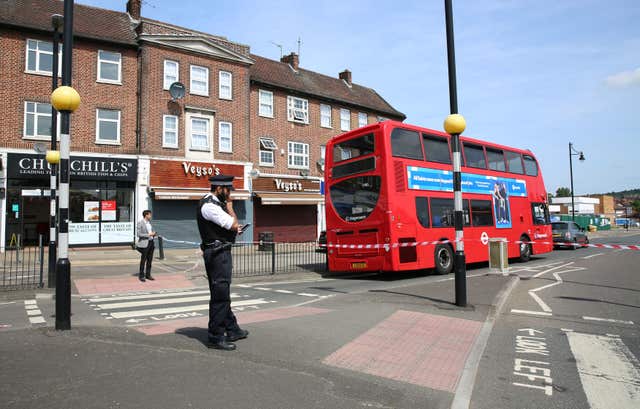 Police at the scene of the stabbing in Romford