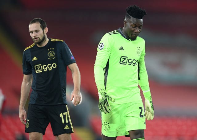 Andre Onana, right, shows his frustration