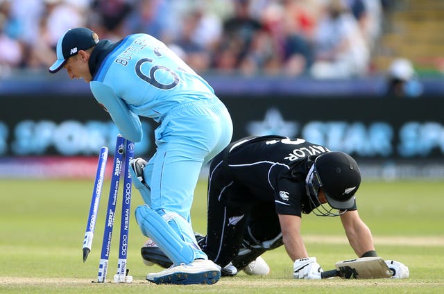 Jos Buttler completes the run out of Ross Taylor as England firmly took control