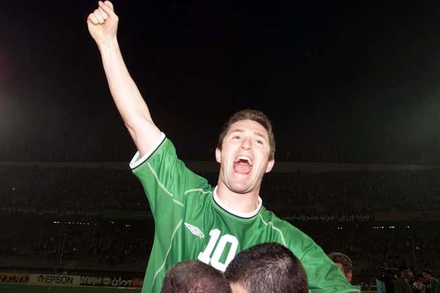 Robbie Keane celebrates in Tehran after after Ireland booked their place at the 2002 World Cup finals