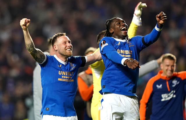 Rangers’ Scott Arfield (left) and Calvin Bassey celebrates victory