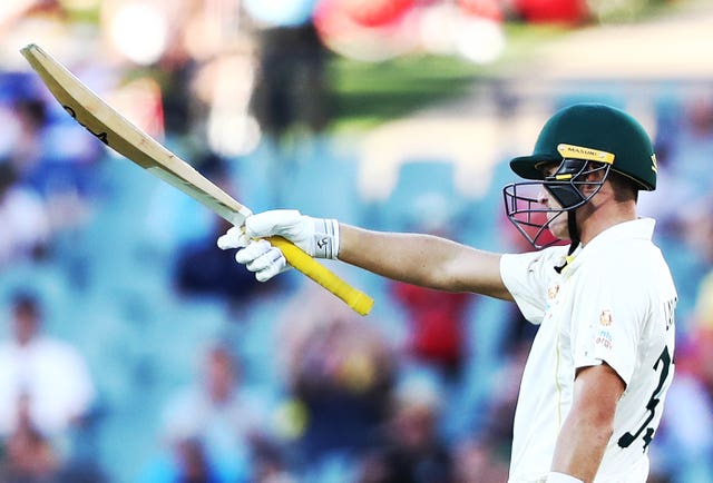 Australia’s Marnus Labuschagne marks bringing up his fifty against England in Adelaide