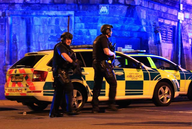Armed police at Manchester Arena after the suicide bombing which killed 22 people (Peter Byrne/PA)