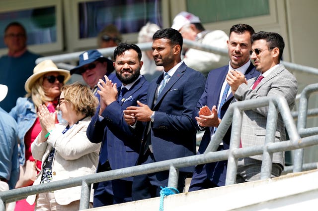 Rafiq stands to applaud on his return to his former home ground.