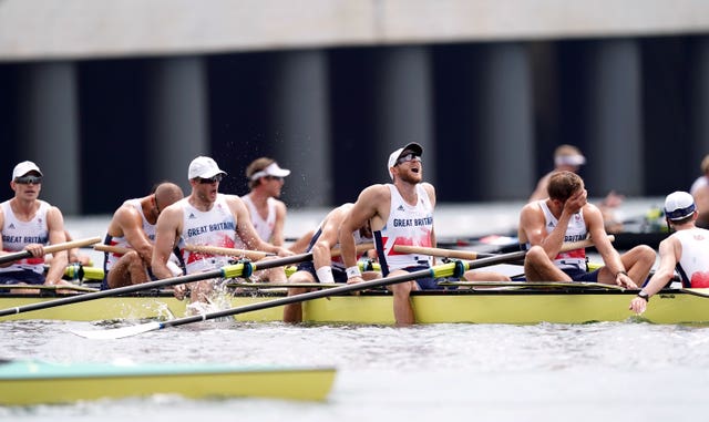 GB's men's eight team after crossing the line