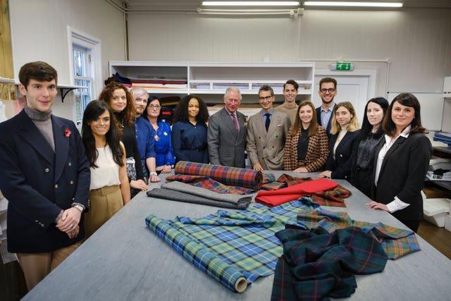 Charles with Modern Artisan students. Mike Wilkinson/PA Wire