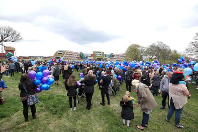 People gather to release balloons outside Alder Hey Children’s Hospital in tribute to Alfie (Peter Byrne/PA)
