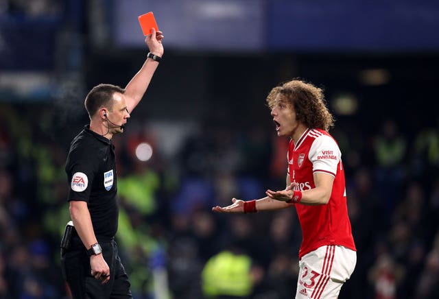 Arsenal battled for a point at Chelsea after David Luiz was sent off