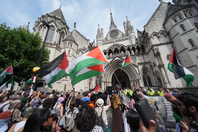 Protesters outside the Royal Courts of Justice