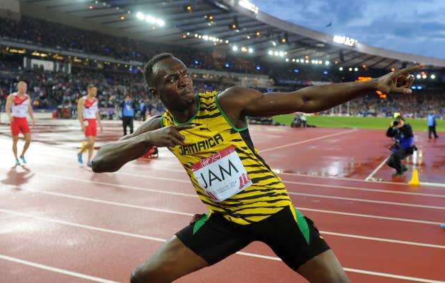 Usain Bolt celebrates winning the men's 4x100m relay at Hampden Park during the 2014 Commonwealth Games 