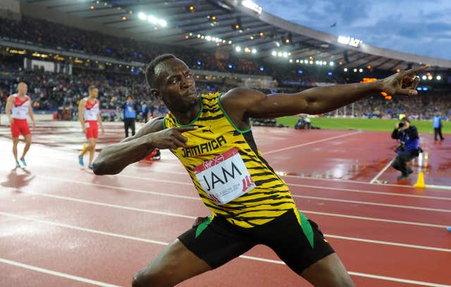 Usain Bolt celebrates winning the men’s 4x100m relay at Hampden Park during the 2014 Commonwealth Games